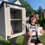 The Nicholas Cumer Little Library with Girl Scout Greta