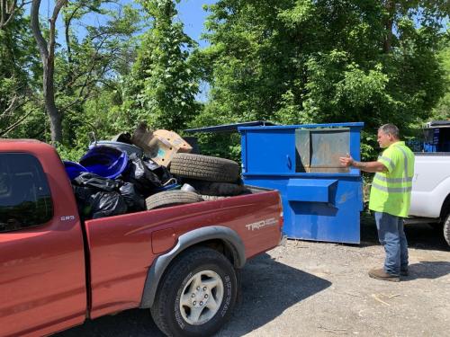 Emptying the truck full of garbage